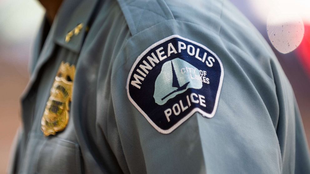 PHOTO: Minneapolis Police Deputy Chief Art Knight speaks with people gathered near a crime scene on June 16, 2020, in Minneapolis, Minn.
