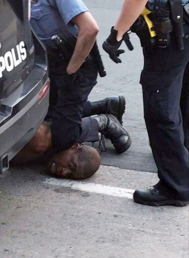 PHOTO: In an image made from video posted to Facebook, a Minneapolis police officer kneels on the neck of a man identified by a family attorney as George Floyd, May 25, 2020. Floyd died shortly after the incident.