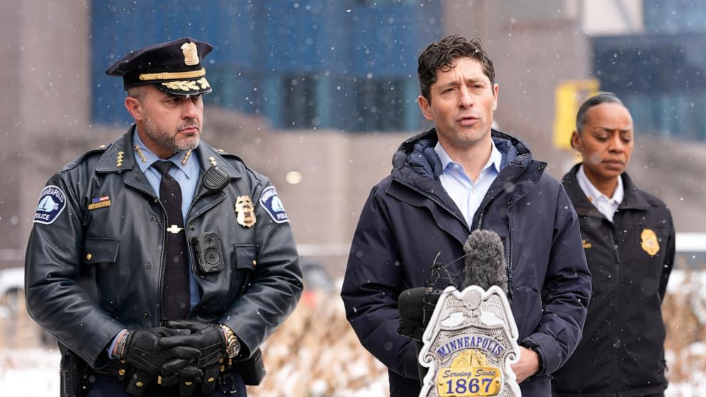PHOTO: Minneapolis Mayor Jacob Frey holds a news conference as Police Chief Brian O'Hara listens, on Jan. 10, 2026, in Minneapolis. 