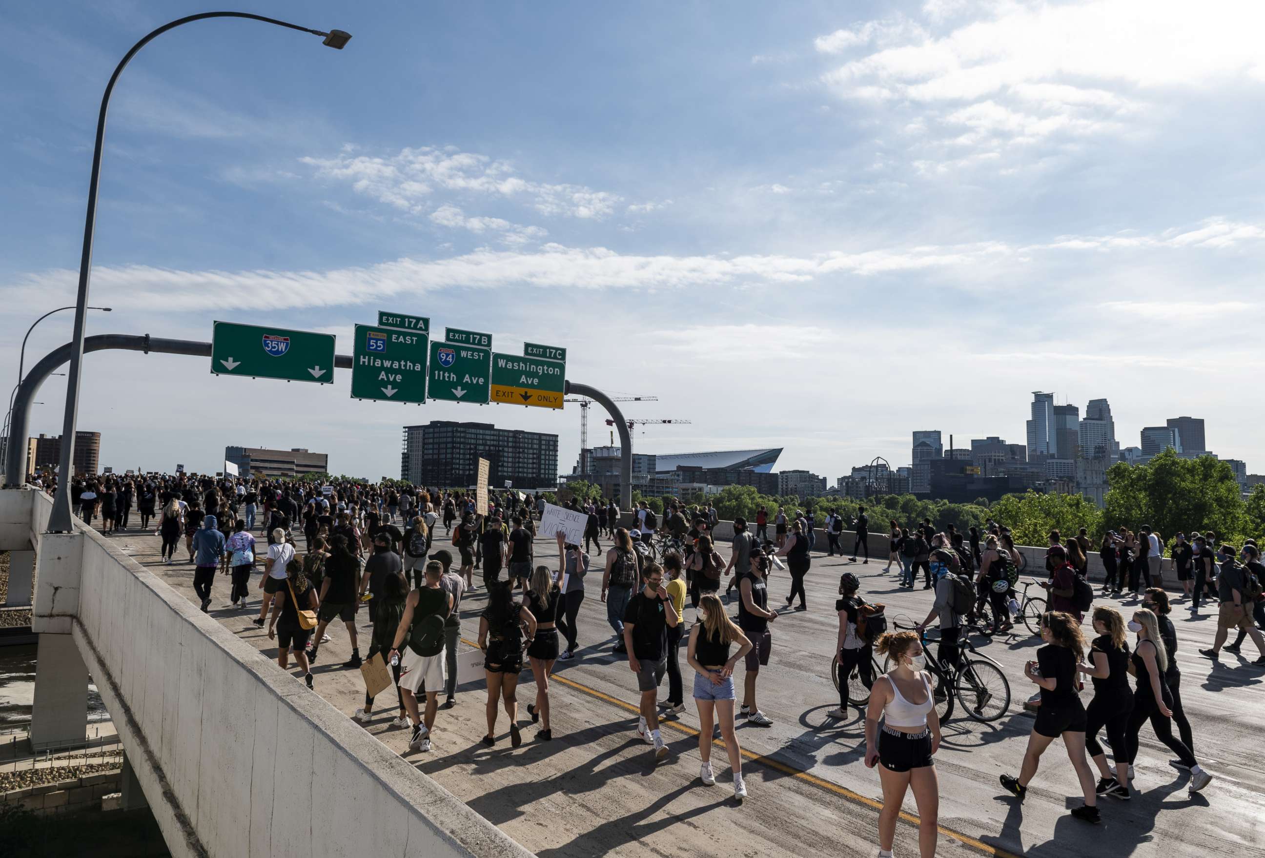 PHOTO: A crowd marches to protest the death of George Ford on the I-35W bridge over the Mississippi River, May 31, 2020 in Minneapolis, Minnesota.
