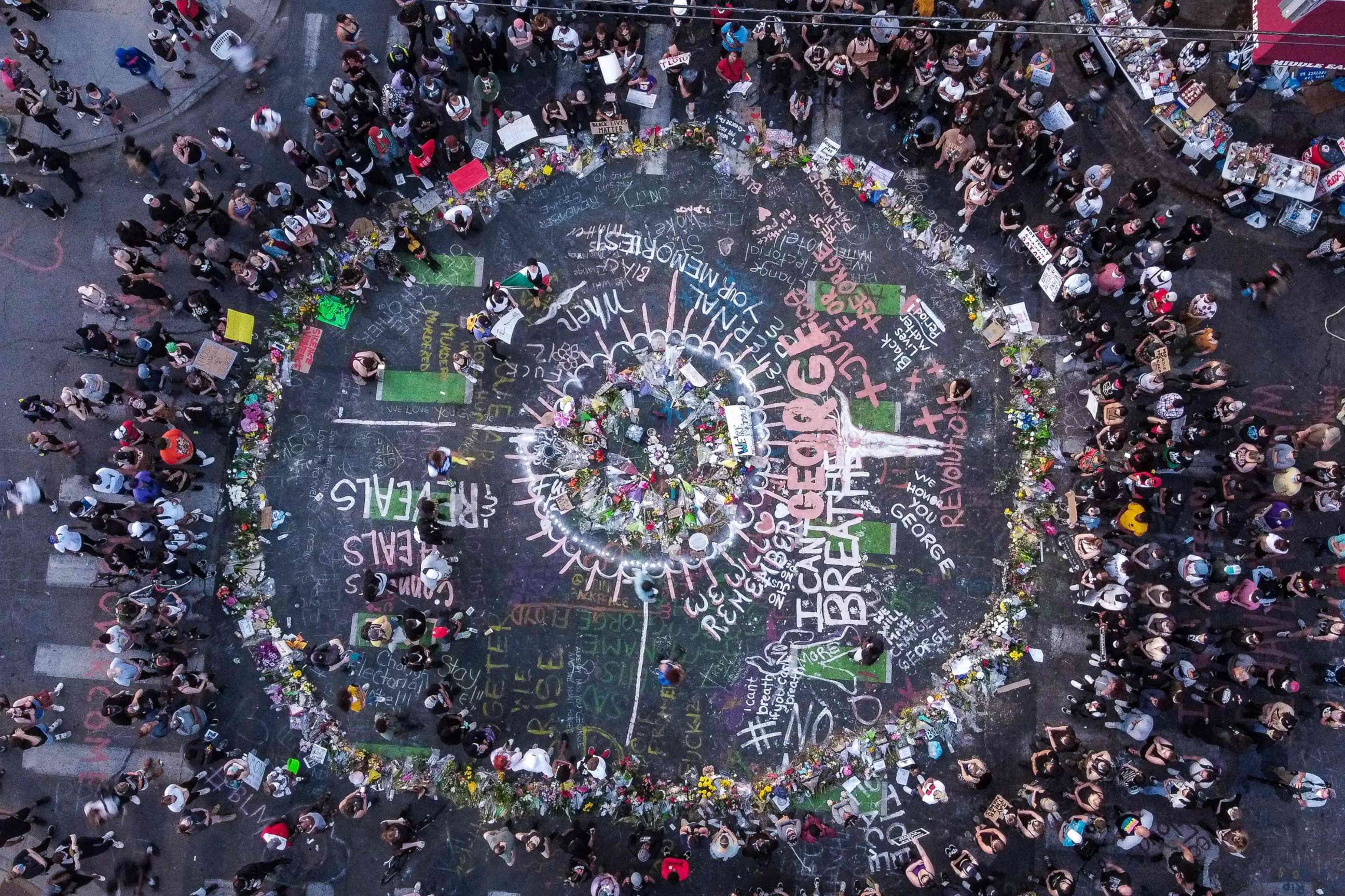 PHOTO: A view of protesters gathered near the makeshift memorial in honor of George Floyd marking one week anniversary of his death, on June 1, 2020 in Minneapolis.