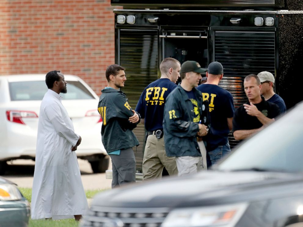 PHOTO: Law enforcement officials investigate an explosion at the Dar Al-Farooq Islamic Center in Bloomington, Minn., Aug. 5, 2017.
