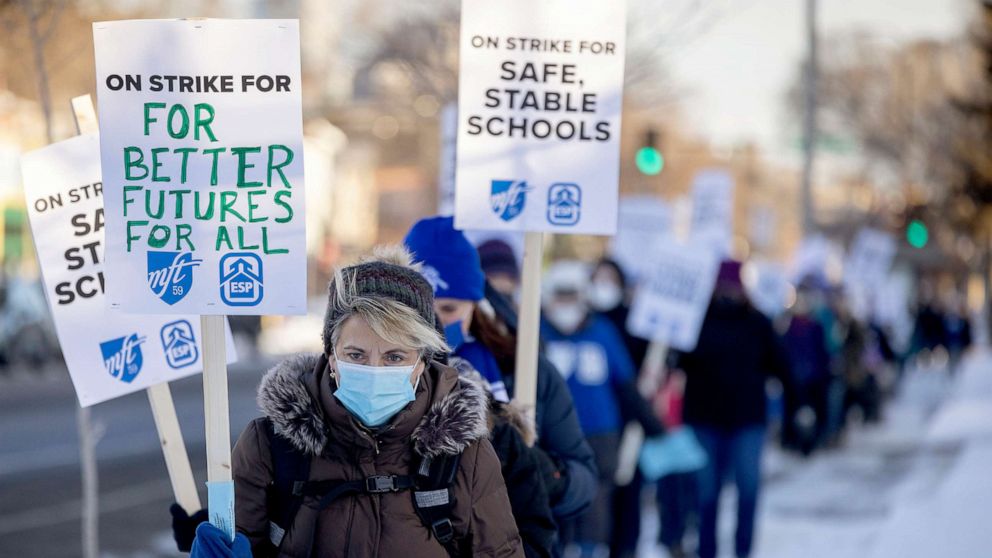PHOTO: Minneapolis teachers and supporters picket at 34th street and Chicago Avenue South in Minneapolis, March 8, 2022.