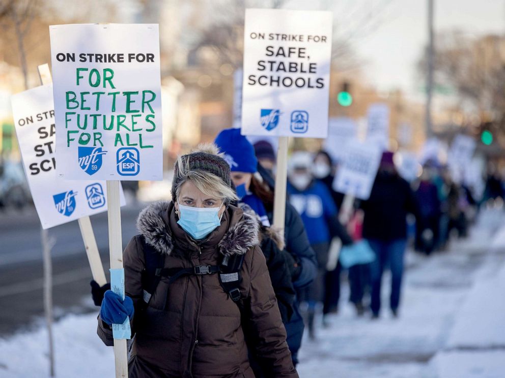 PHOTO: Minneapolis teachers and supporters picket at 34th street and Chicago Avenue South in Minneapolis, March 8, 2022.