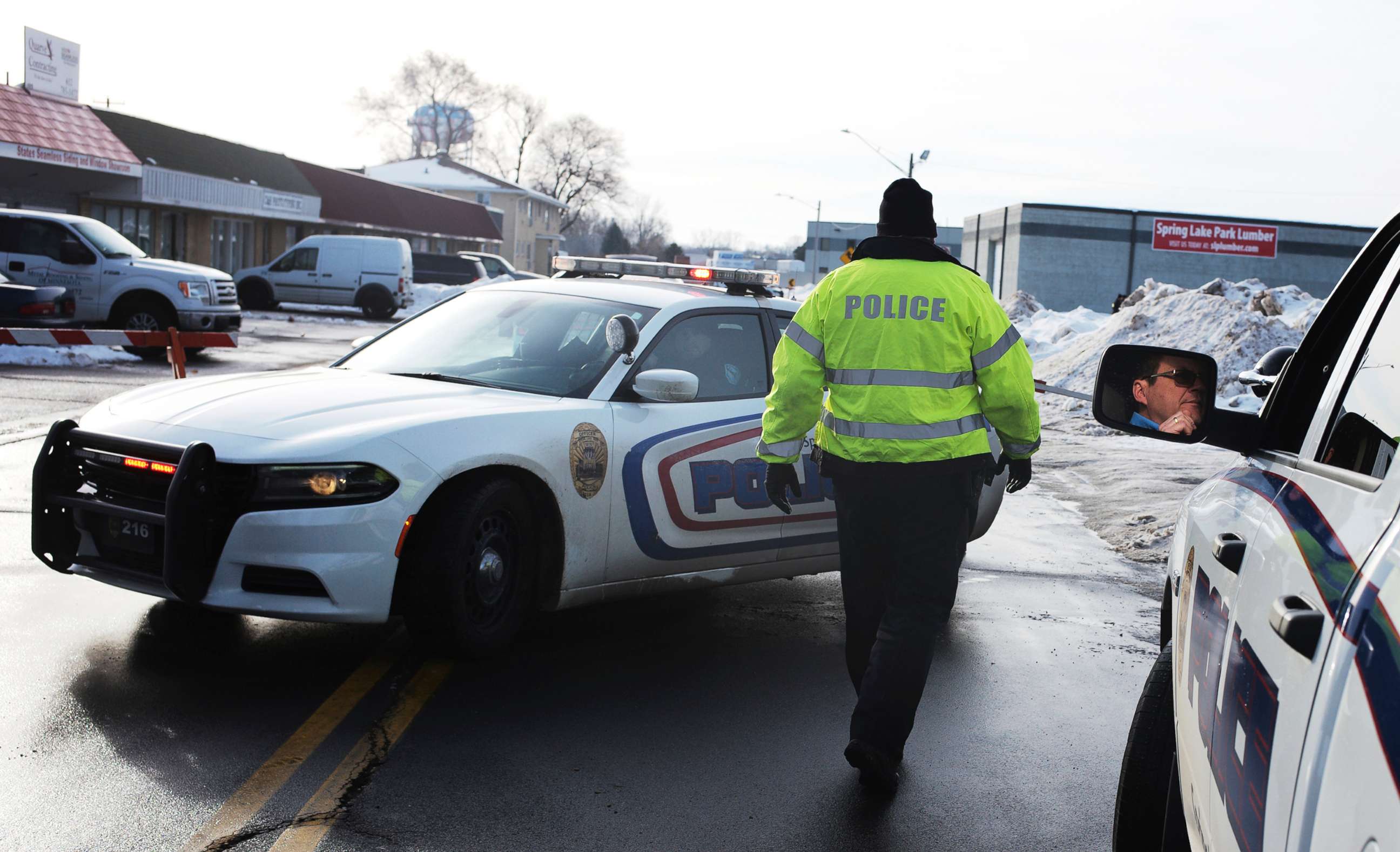 PHOTO: Spring Lake police officers investigate the scene of a shooting in Spring Lake, Minn., Dec. 22, 2019.