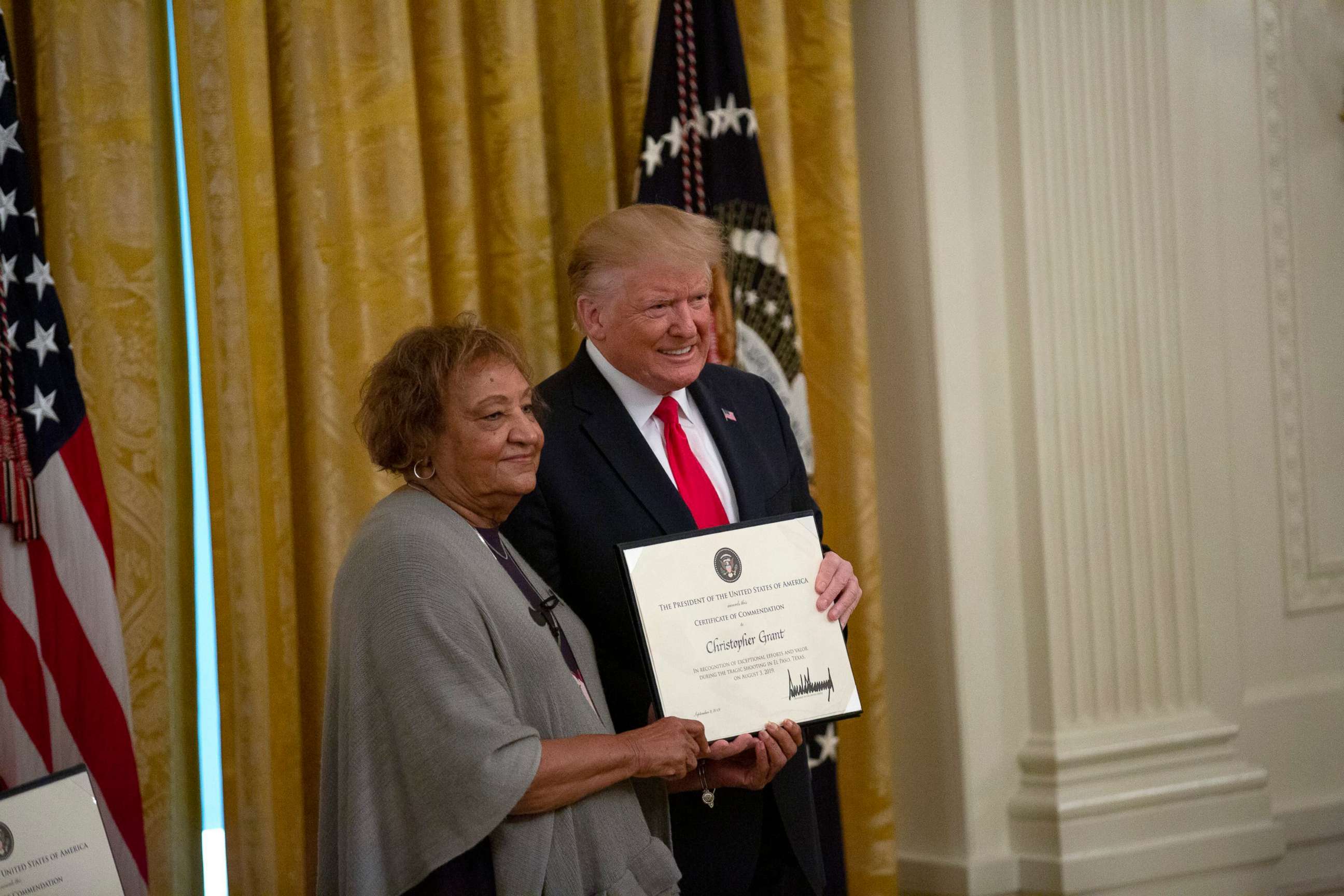 PHOTO: Ms. Minnie Grant accepts Heroic Commendations from President Donald J. Trump on behalf of her son, Chris Grant, in an East Room ceremony at the White House in Washington D.C., Sept. 9, 2019.
