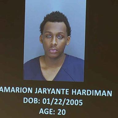 A possible mass shooting plot at a Michigan graduation ceremony was thwarted, authorities said, and police are searching for one of the suspects who remains at large.