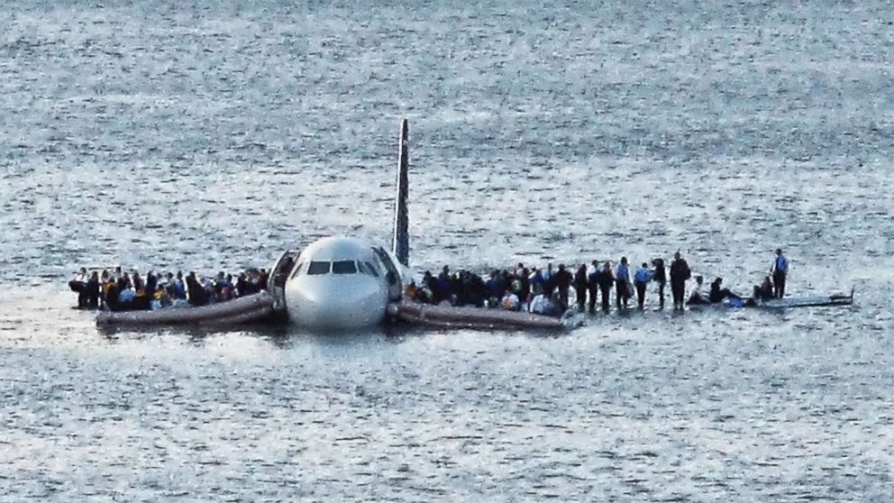 PHOTO: In this Jan. 15, 2009 file photo, airline passengers wait to be rescued on the wings of a US Airways Airbus 320 jetliner that safely ditched in the frigid waters of the Hudson River in New York, after a flock of birds knocked out both its engines.