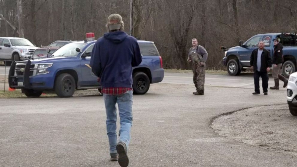 PHOTO: Volunteers congregate near the command post for the search for 5-year-old Beau Belson in Six Lakes, Mich., Dec. 26, 2019.
