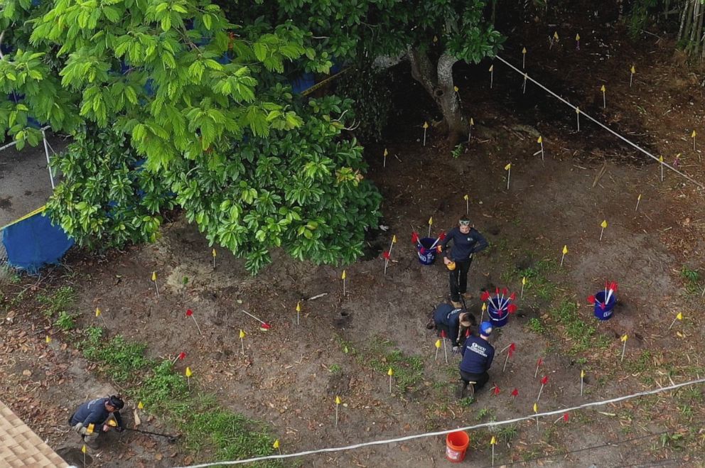 PHOTO: Florida Gulf Coast University anthropologists search the backyard of a home on 2nd Street searching in the case of Christy Luna who went missing 35 years ago from a store a block away from this site in Greenacres, Fla., on August 5, 2019.