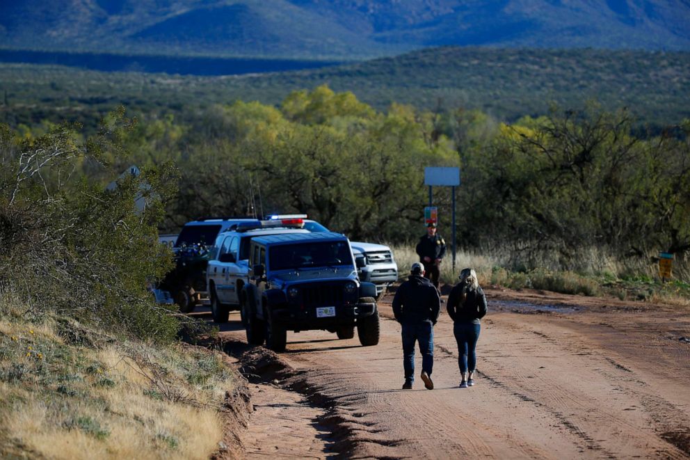 PHOTO: Police officers close the road outside Tonto Creek near Bar X road in Tonto Basin, Ariz., Nov. 30, 2019.
