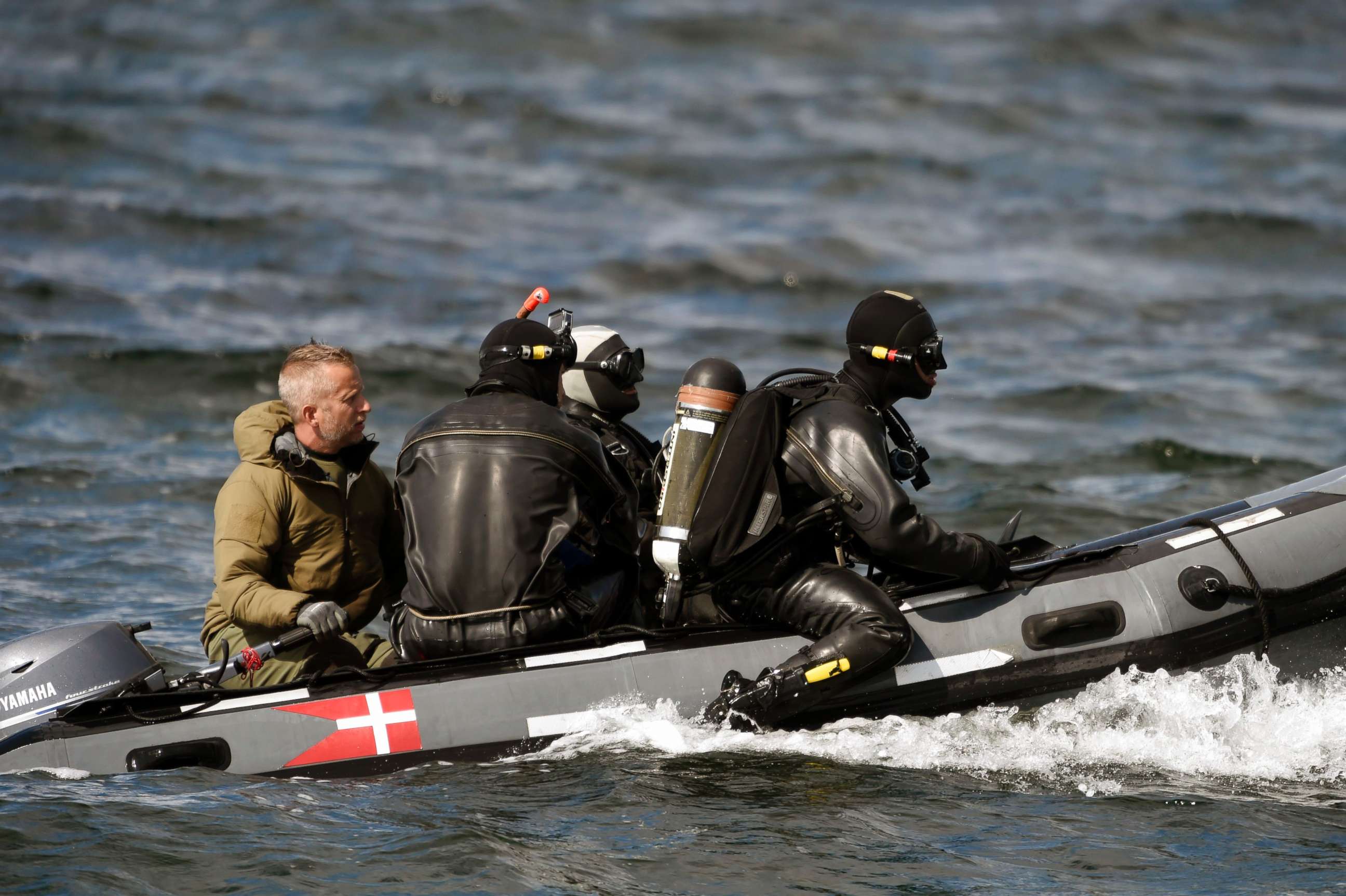 PHOTO: Divers from the Danish Defence Command preparing for a dive in Koge Bugt near Amager in Copenhagen, Aug. 22, 2017, where a woman's torso was found yesterday.