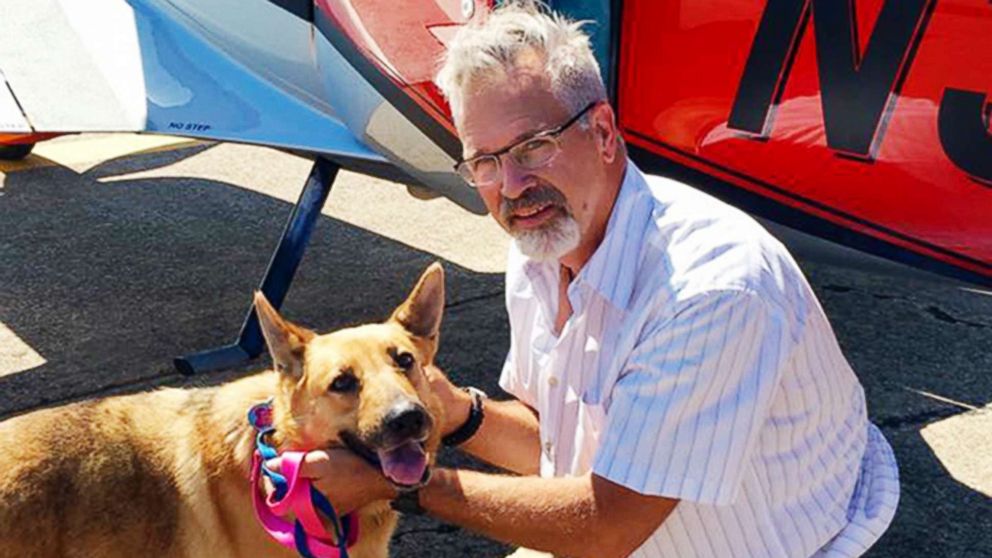 Dr. Bill Kinsinger, with Jojo, a dog from Fort Worth Animal Care & Control, at a regional airport in northern Illinois, June 6, 2016 in a photo provided by Best Fur Friends Rescue. Officials said Kinsinger failed to land his small plane at an airport in Central Texas and was later tracked by fighter jets flying over the Gulf of Mexico and appeared unresponsive.