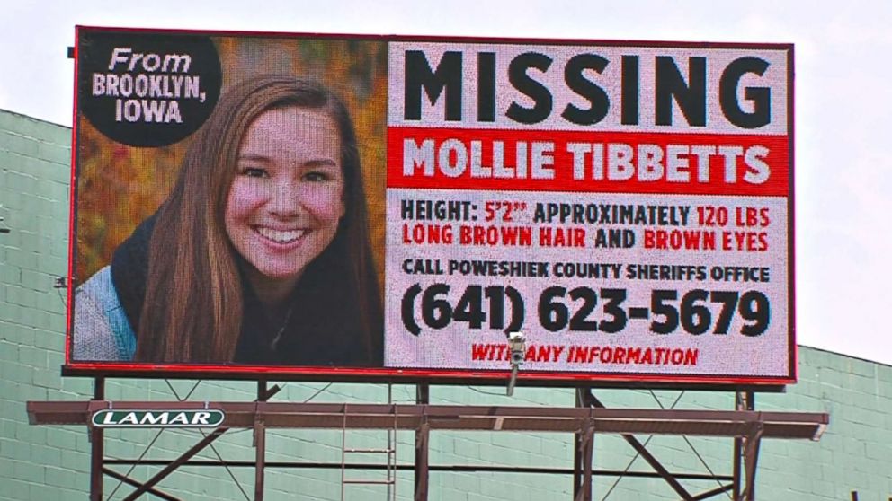 PHOTO: A missing person billboard for University of Iowa student Mollie Tibbetts. 