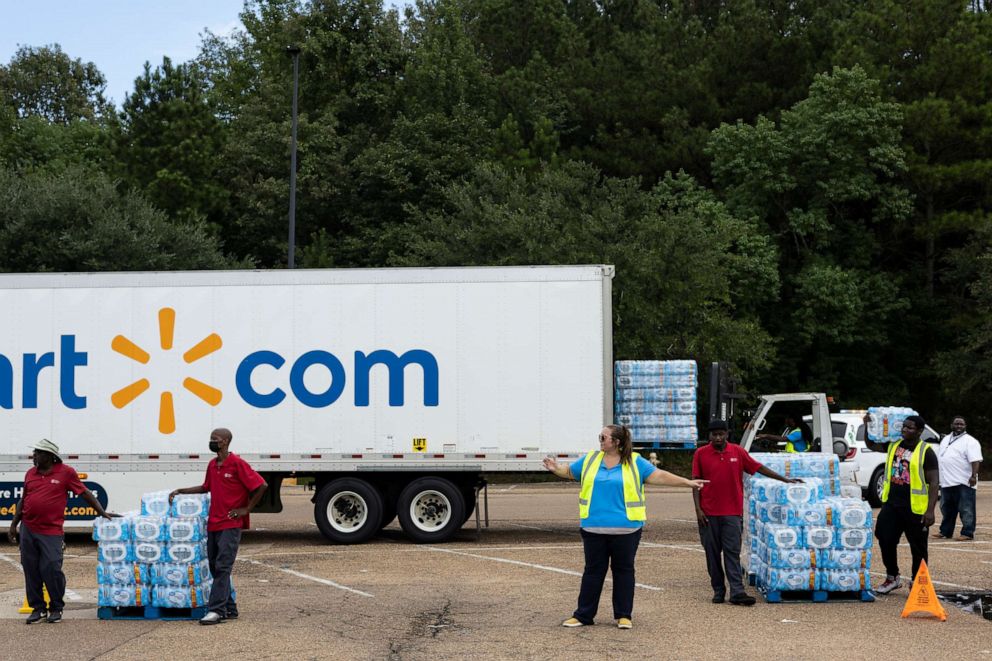 PHOTO: The Salvation Army of Jackson and Walmart distribute bottled water at a Walmart location, Aug. 31, 2022, in Jackson, Miss.