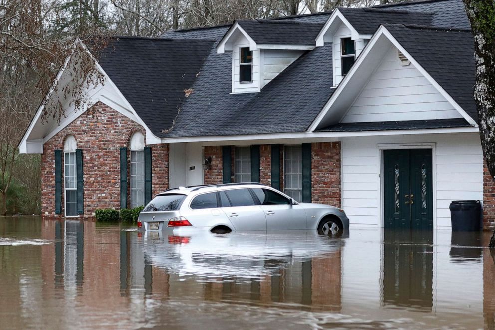 PHOTO: Water from the Pearl River floods this northeast Jackson, Miss., home and car, Feb. 16, 2020. Authorities believe the flooding will rank as third highest, behind the historic floods of 1979 and 1983.