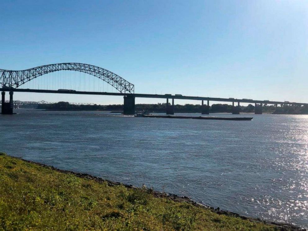 PHOTO: A barge moves north on the Mississippi River under the Interstate 40 bridge connecting Tennessee and Arkansas on Sept. 29, 2022, in Memphis, Tenn.