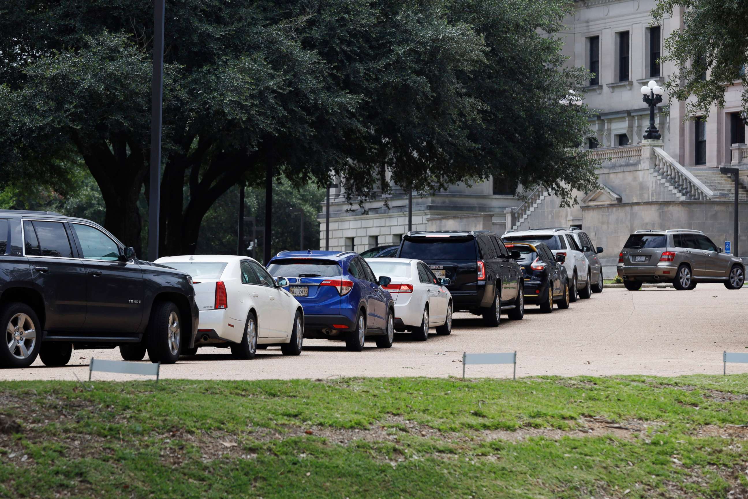 PHOTO: Mississippi legislators, staff and Capitol employees take advantage of a drive-thru COVID-19 testing center on the Capitol grounds in Jackson, Miss., July 6, 2020, after House Speaker Philip Gunn tested positive for COVID-19.