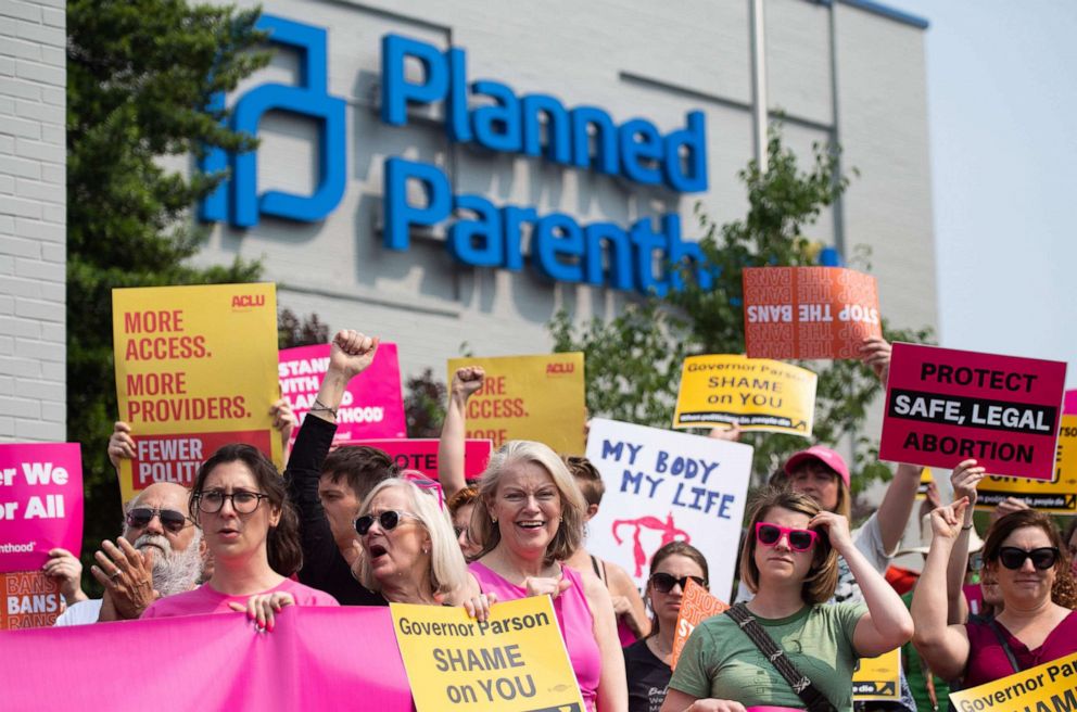 PHOTO: In this file photo taken on May 31, 2019, pro-choice supporters and staff of Planned Parenthood hold a rally outside the Planned Parenthood Reproductive Health Services Center in St. Louis.