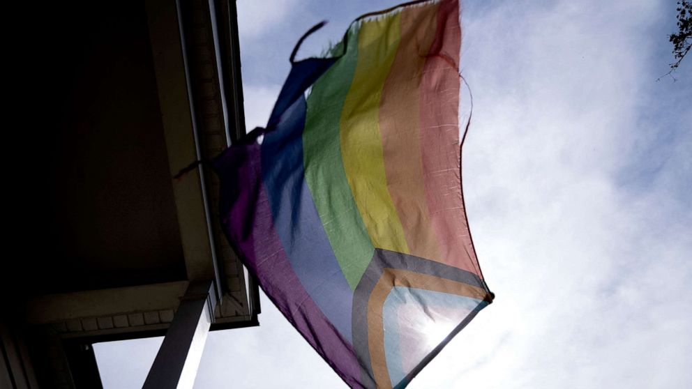 PHOTO: An LGBTQ pride flag is displayed outside a home in Alexandria, Virginia, on April 11, 2022. 