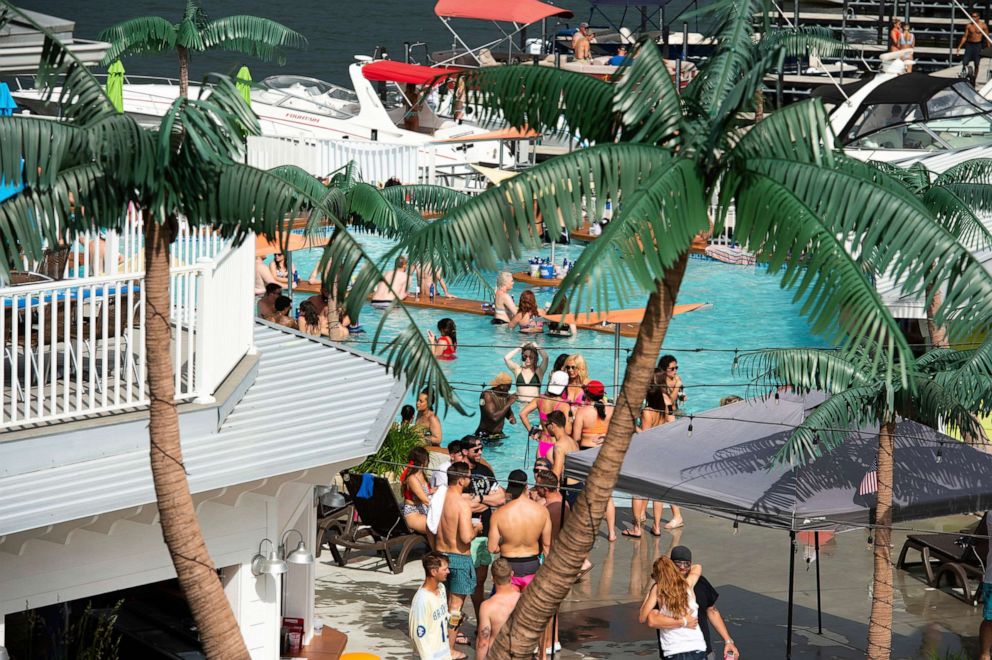 PHOTO: Crowds of people gather at Coconuts Caribbean Beach Bar & Grill in Gravois Mills, Mo., May 24, 2020. Several beach bars along Lake of the Ozarks were packed with party-goers during the Memorial Day weekend.