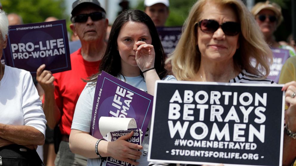 PHOTO: Anti-abortion supporters gather outside the Planned Parenthood clinic Tuesday, June 4, 2019, in St. Louis.