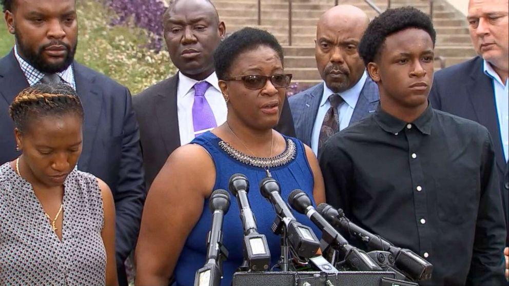 PHOTO: Allison Jean stands between her children, Allisa Charles-Findley and Brandt Jean, as she speaks at a press conference about her son who was killed by a police officer in Dallas on Monday, Sept. 10, 2018.