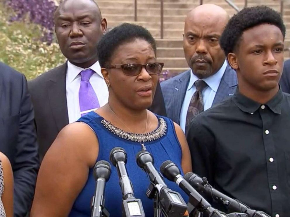 PHOTO: Allison Jean stands between her children, Allisa Charles-Findley and Brandt Jean, as she speaks at a press conference about her son who was killed by a police officer in Dallas on Monday, Sept. 10, 2018.