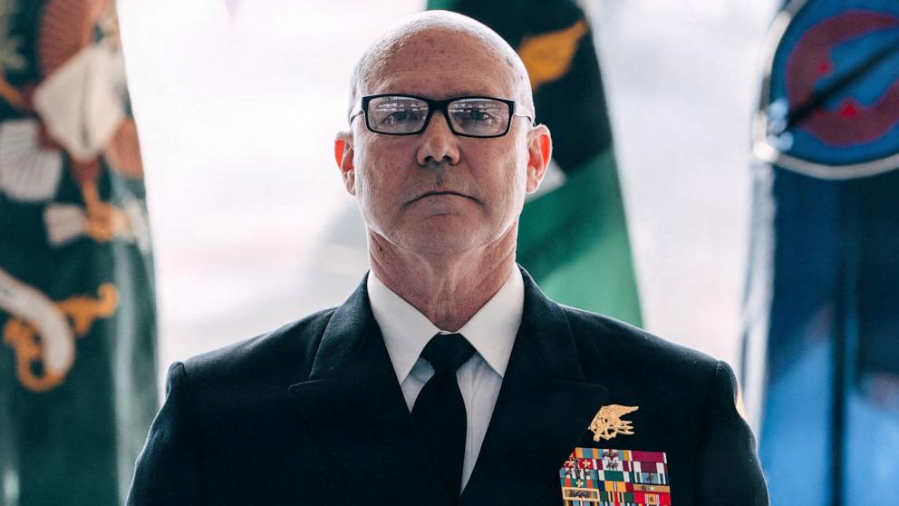 PHOTO: U.S. Special Operations Command commander Admiral Frank 'Mitch' Bradley stands at attention during the USASOC Assumption of Command ceremony at Fort Bragg, North Carolina, November 24, 2025.