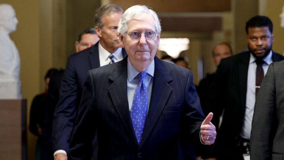PHOTO: Senate Minority Leader Mitch McConnell gives a thumbs up as he exits a meeting with Senate Republicans at the U.S. Capitol November 16, 2022 in Washington.
