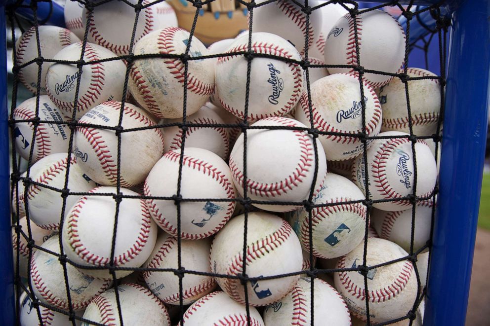 PHOTO: A cart filled with baseballs is set up for batting practice prior to a game between the Chicago Cubs and the Los Angeles Dodgers at Wrigley Field, May 8, 2022, in Chicago.