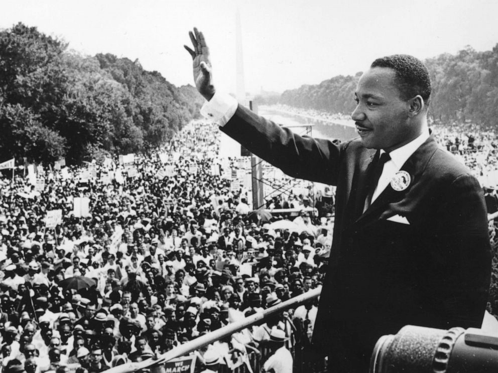 PHOTO: The civil rights leader Martin Luther King waves to supporters at the National Mall in Washington, Aug. 28, 1963.
