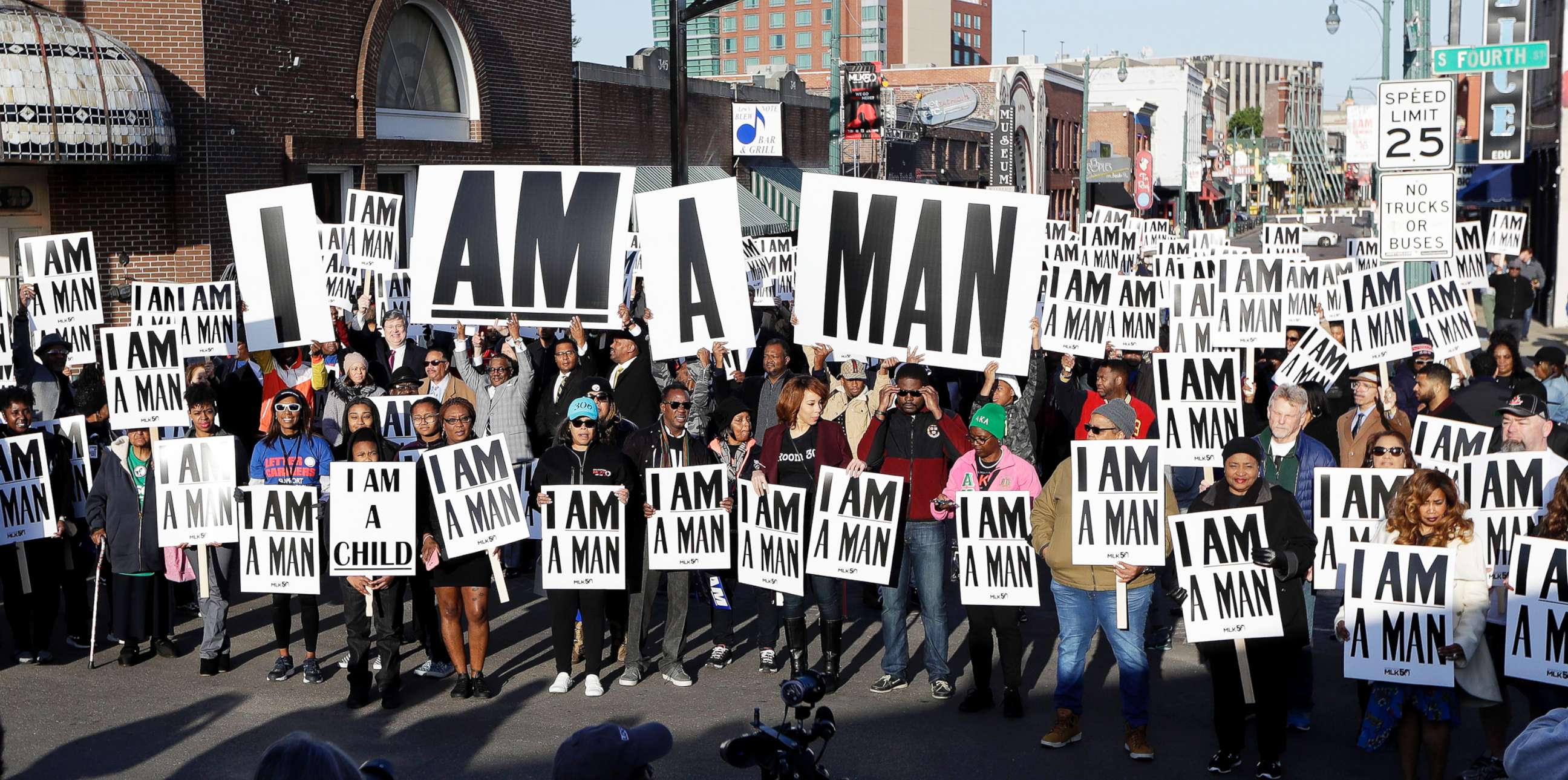 PHOTO: People hold signs resembling the signs carried by striking sanitation workers in 1968 as they join in events commemorating the 50th anniversary of the assassination of the Rev. Martin Luther King Jr. on April 4, 2018, in Memphis, Tenn.