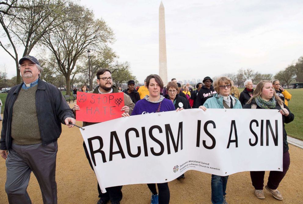 PHOTO: People commemorating the 50th anniversary of the assassination of Rev. Martin Luther King, Jr., hold a silent prayer walk from the Martin Luther King Jr. Memorial past the Washington Monument to the National Mall in Washington, D.C, April 4,  2018.