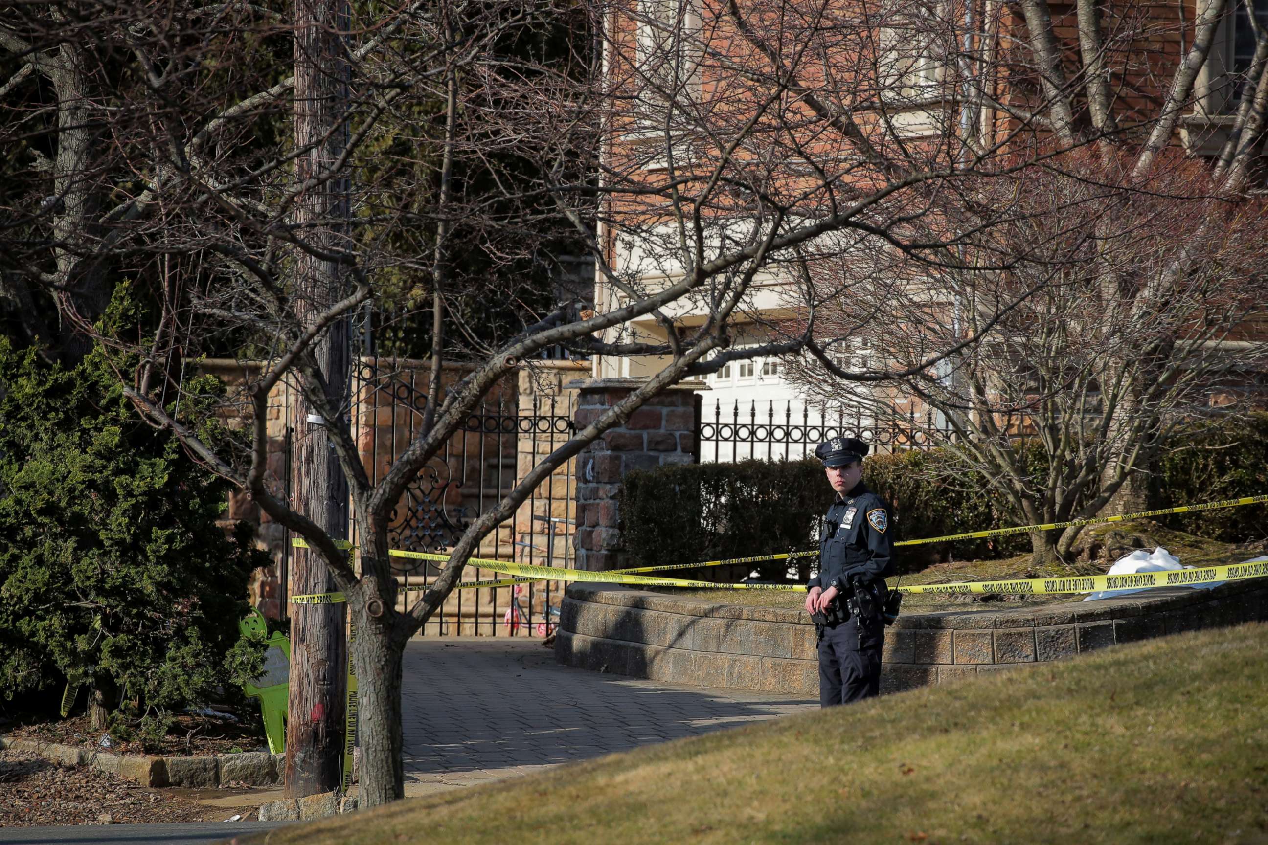 PHOTO: New York City Police officer is seen at the scene where reported New York Mafia Gambino family crime boss, Francesco "Franky Boy" Cali, was killed outside his home in the Staten Island borough of New York, March 14, 2019.