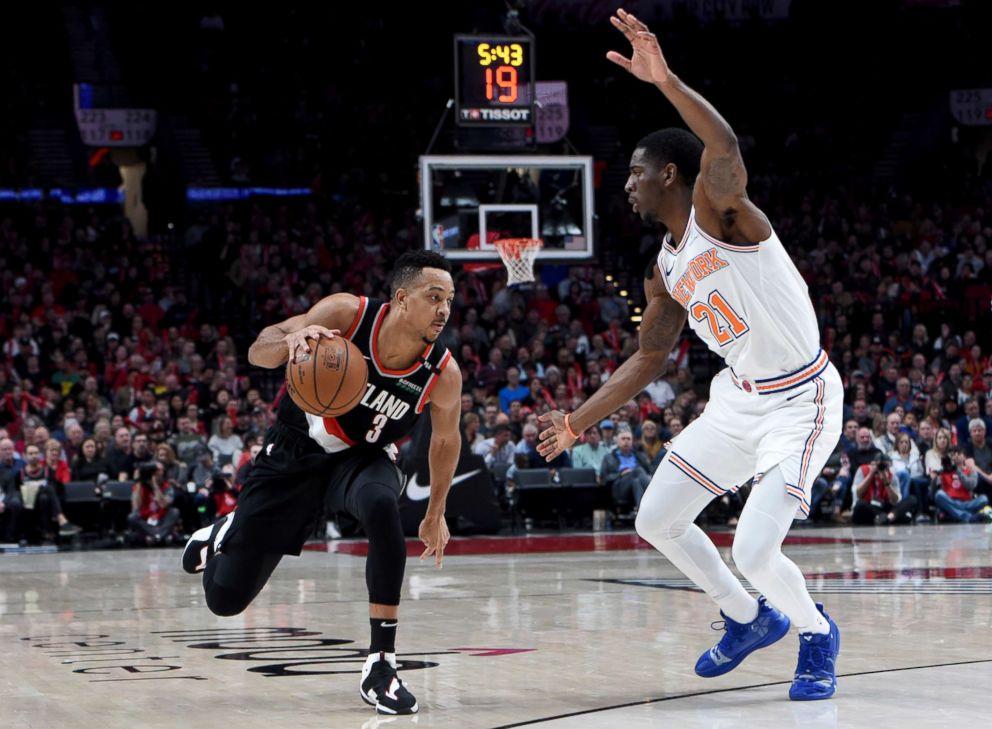 PHOTO: The Portland Trail Blazers guard CJ McCollum (3) drives to the basket against New York Knicks guard Damyean Dotson (21) during the second half at the Moda Center, Jan 7, 2019. 