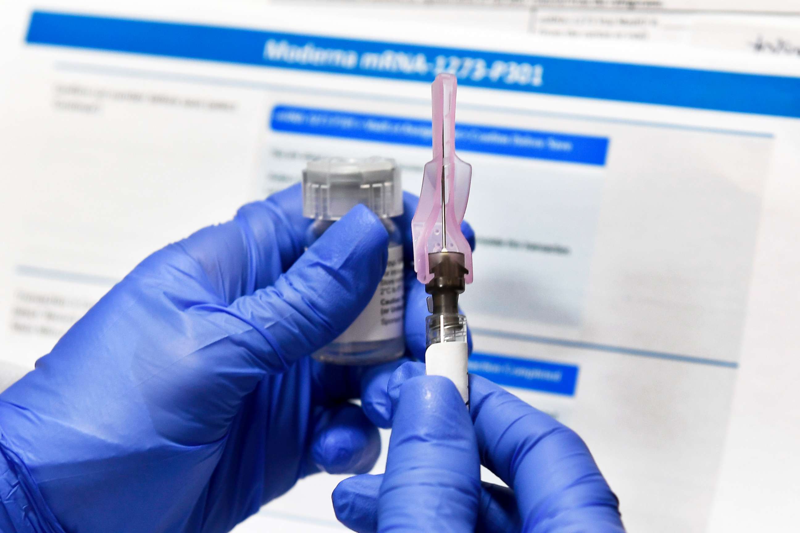 PHOTO: A nurse prepares a shot for a study of a possible COVID-19 vaccine, developed by the National Institutes of Health and Moderna Inc.,  in Binghamton, N.Y., July 27, 2020.