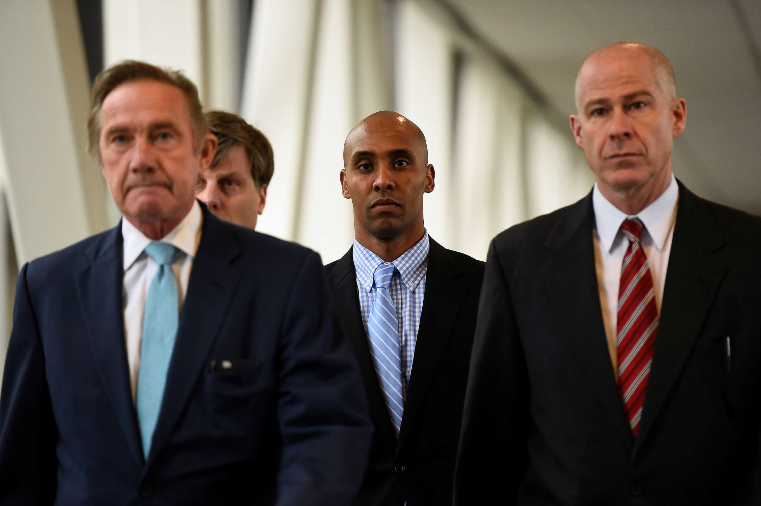 PHOTO: Mohamed Noor, center, former Minnesota policeman on trial for fatally shooting an Australian woman, walks into the courthouse in Minneapolis, Minn., April 30, 2019.