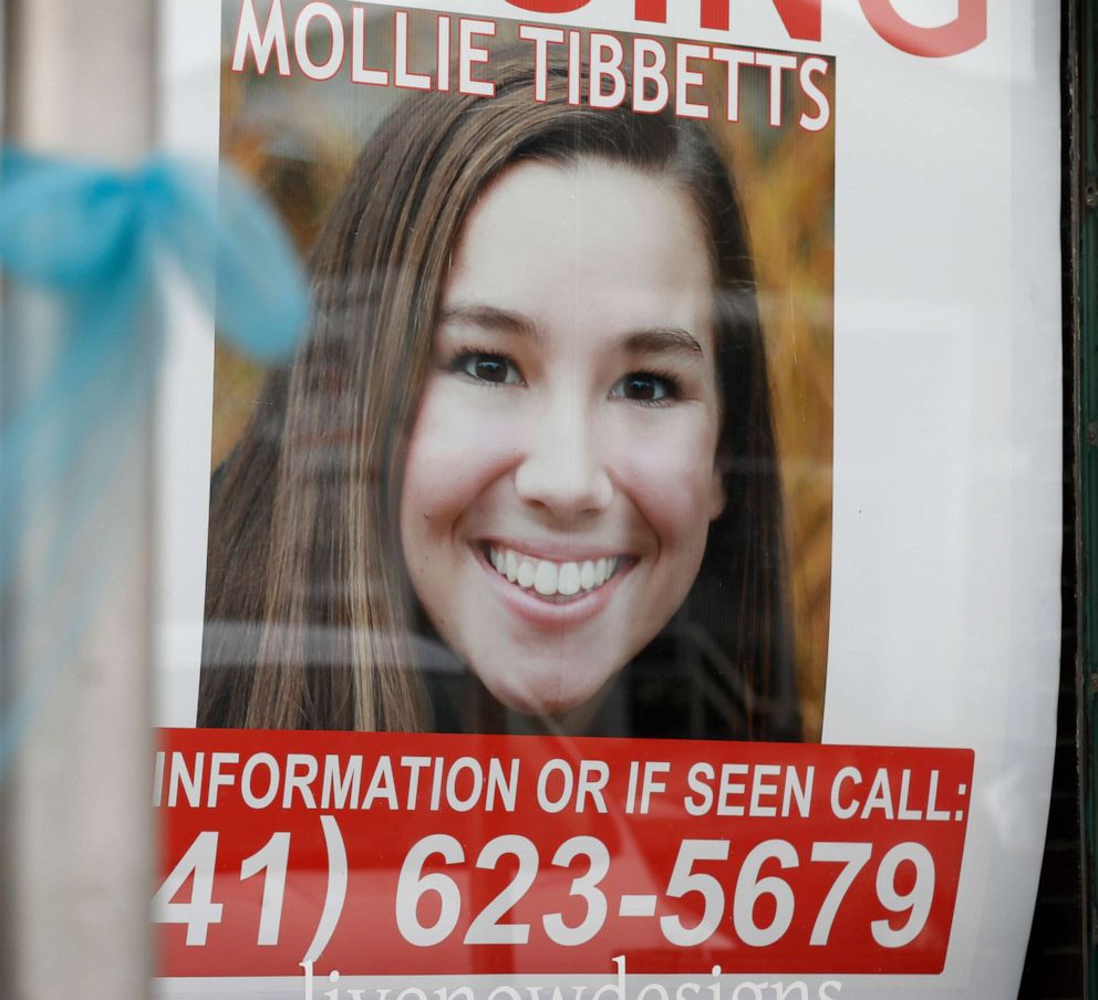 PHOTO: In this Aug. 21, 2018, file photo, a poster for missing University of Iowa student Mollie Tibbetts hangs in the window of a local business in Brooklyn, Iowa.