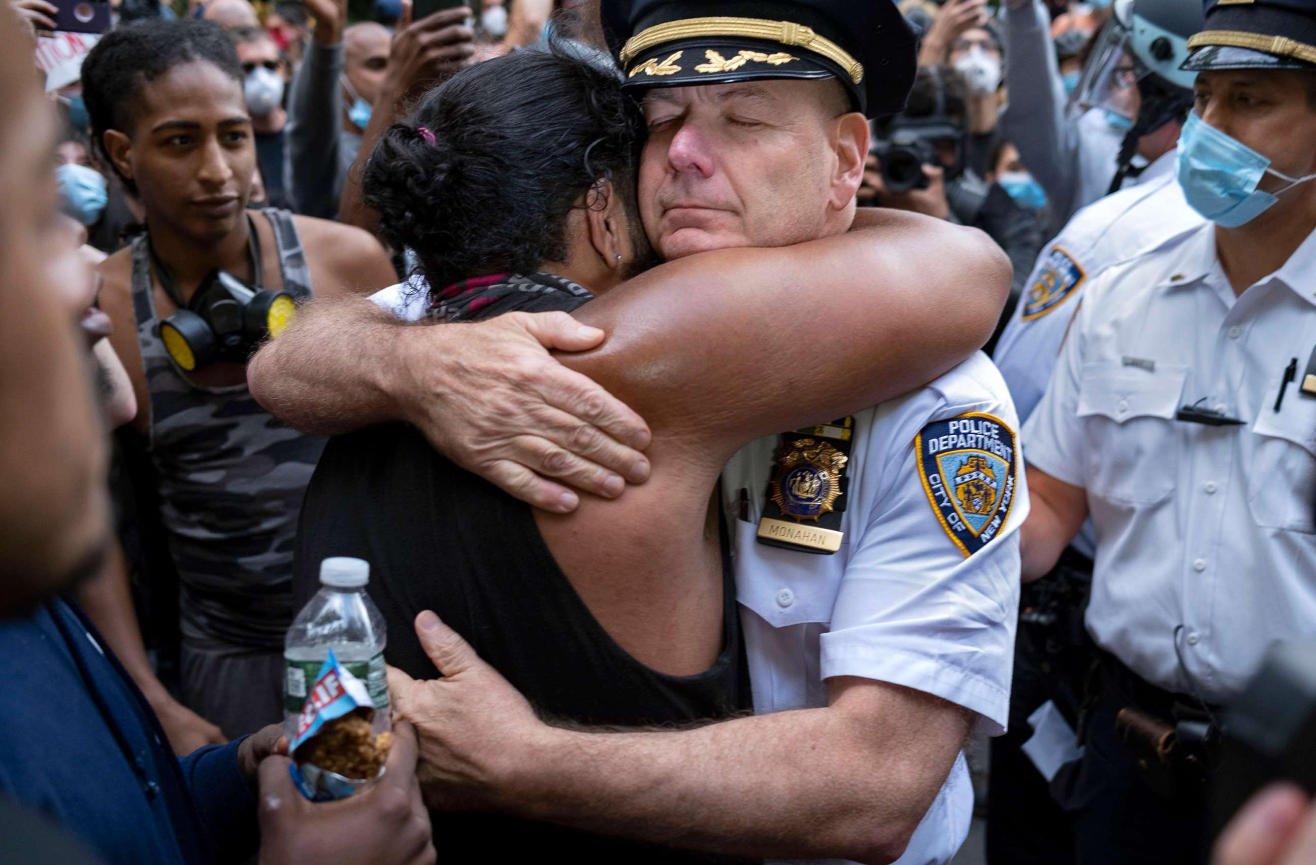 PHOTO: Chief of Department of the New York City Police, Terence Monahan, hugs an activist during a protest in New York, June 1, 2020. 