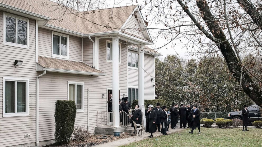 PHOTO: People gather at Rabbi Chaim Rottenberg's residence in Monsey, N.Y., Dec. 29, 2019.