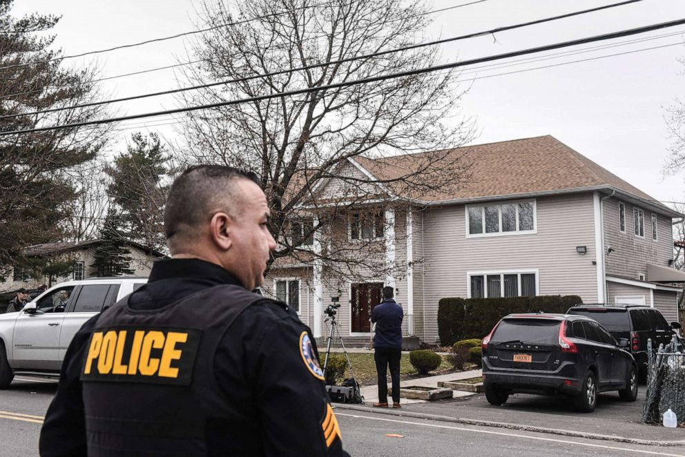 PHOTO: A member of the Ramapo police stands guard in front of the house of Rabbi Chaim Rottenberg on Dec. 29, 2019 in Monsey, New York, the day after five people were injured in a knife attack during a Hanukkah party.