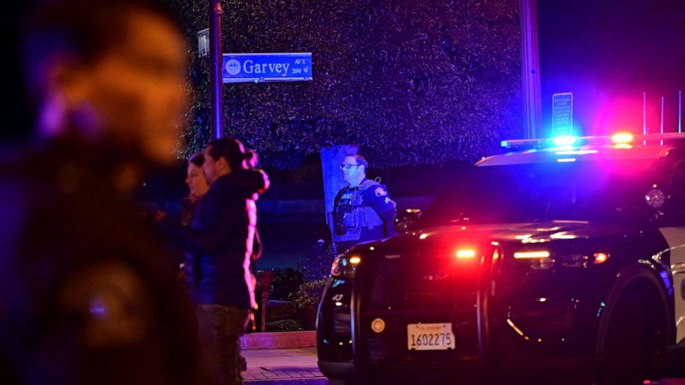 PHOTO: Police patrol the scene along Garvey Avenue in Monterey Park, California, on Jan. 21, 2023, where police are responding to reports of multiple people shot.