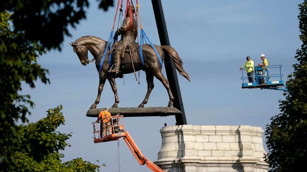 PHOTO: The statue of Confederate Gen. Robert E. Lee is removed in Richmond, Va., Sept. 8, 2021, more than 130 years after it was erected.