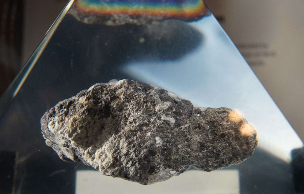 PHOTO: A rock from the moon is seen displayed inside a plexiglass case during a gala reuniting the Apollo team responsible for the historic lunar landing 50 years ago aboard the USS Hornet in Alameda, Calif., on July 16, 2019.