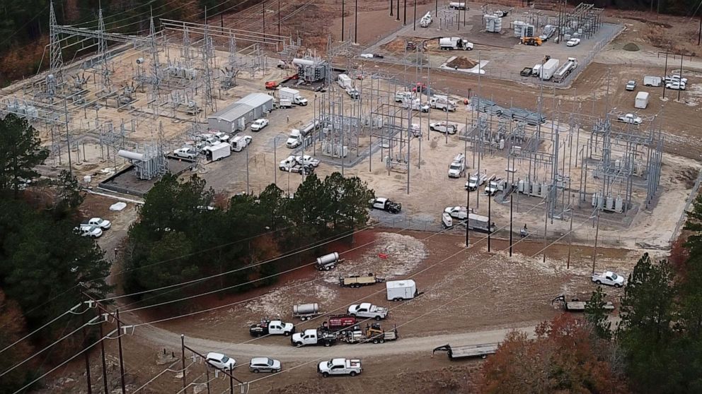 PHOTO: Duke Energy workers repair a crippled electrical substation that they said was hit by gunfire after the Moore County Sheriff said that vandalism caused a mass power outage, in Mineral Springs near Pinehurst, N.C., Dec. 6, 2022.