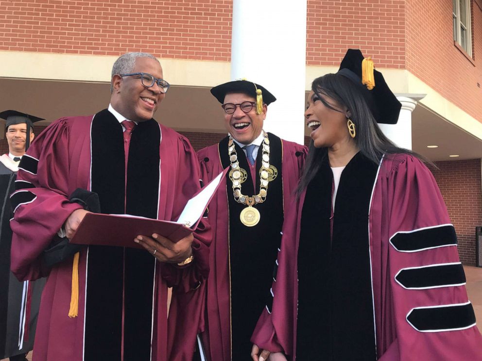 PHOTO: Robert F. Smith, left, laughs with David Thomas, center, and actress Angela Bassett at Morehouse College, May 19, 2019, in Atlanta.