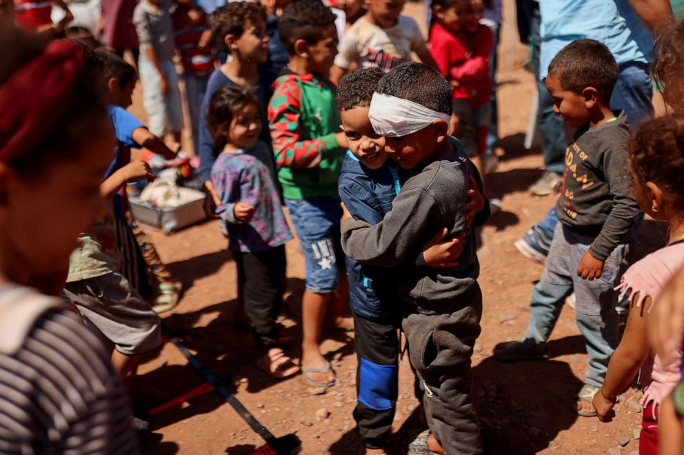 PHOTO: Children play next to a camp for earthquake survivors in Asni, Morocco on Sept. 13, 2023.