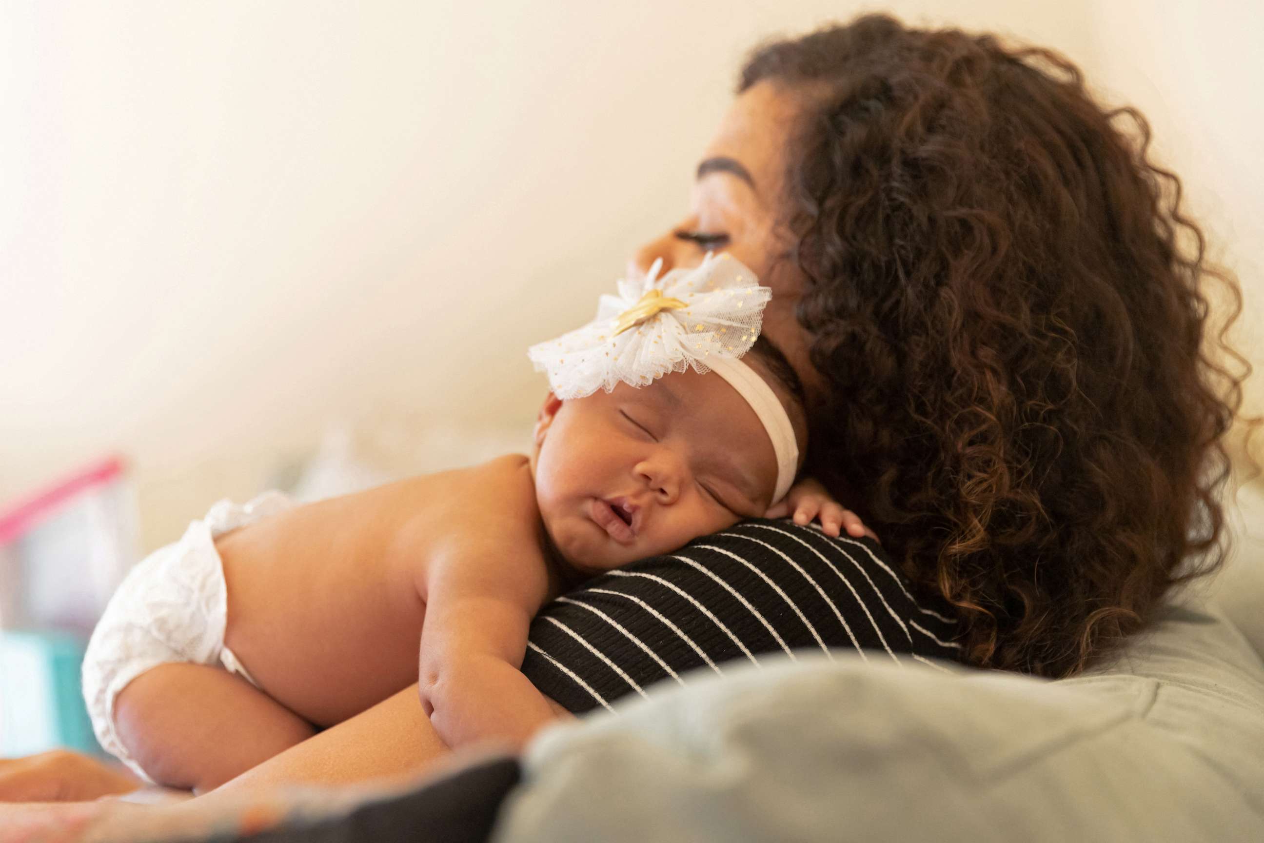 PHOTO: Bianca Haynes holds her sleeping newborn daughter Zuri in Elmwood Park, N.J., May 30, 2022.