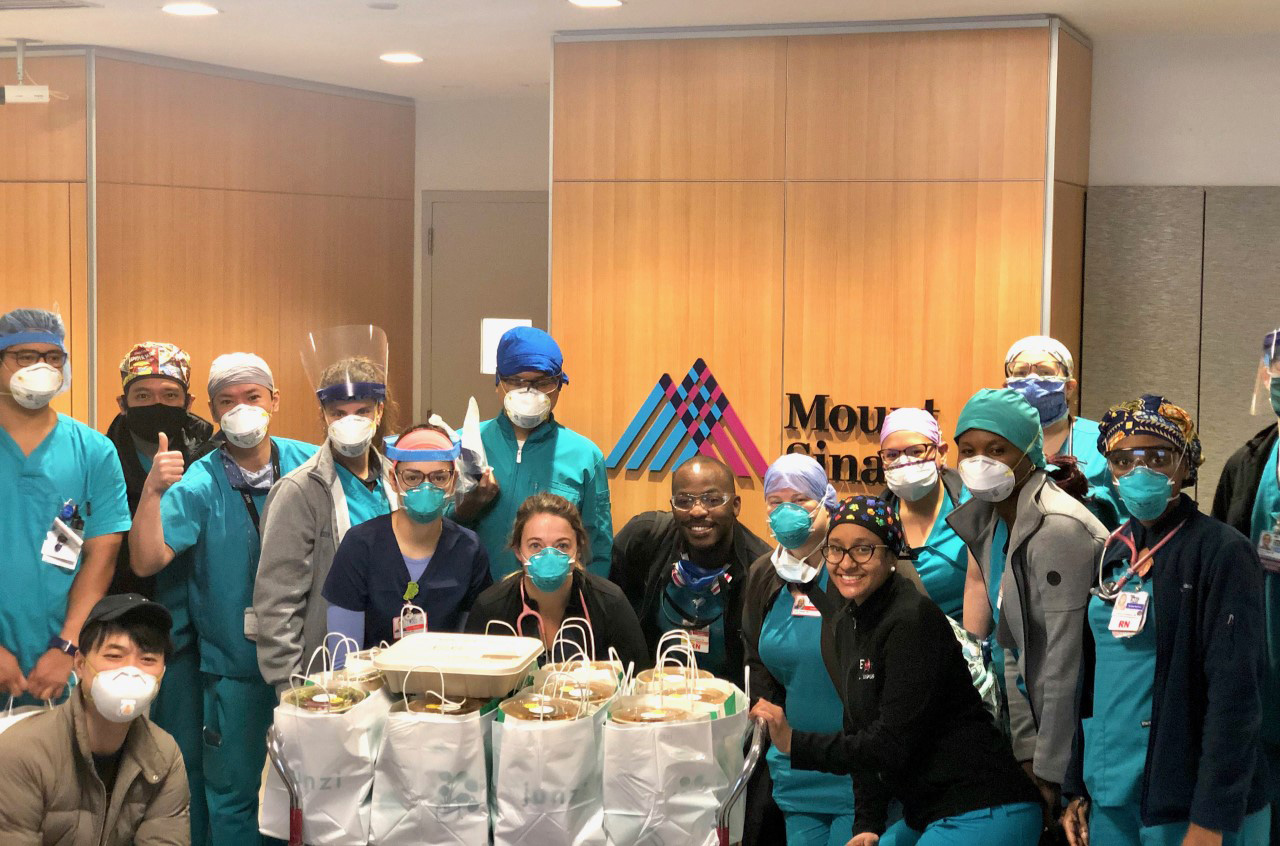 PHOTO: Emergency Department overnight staff at Mount Sinai Morningside in New York City on April 11, 2020, after receiving 110 meals from Junzi Kitchen.